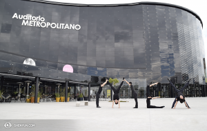 Can you tell these dancers are excited to be traveling? Here they are in front of the Metropolitan Auditorium, Sirio Street at the corner of Pléyades in Puebla, Mexico. (photo by dancer Pierre Huang)
